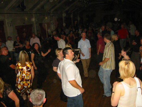 busy dancefloor with birthday boy tommy hall in foreground