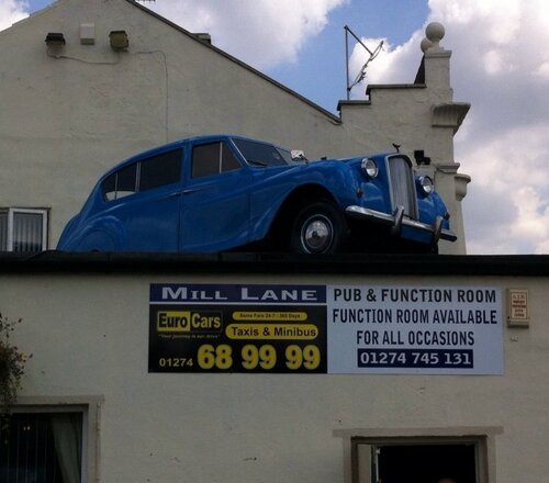 blue car on roof