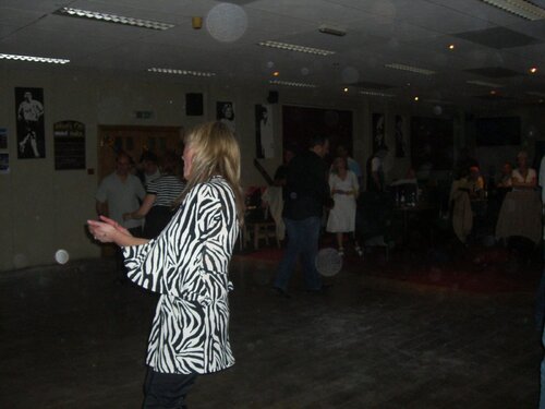 debs and some fat bloke in the background