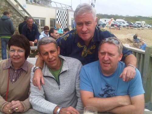 pete and cathy lyster share a moment with the lloyd brothers