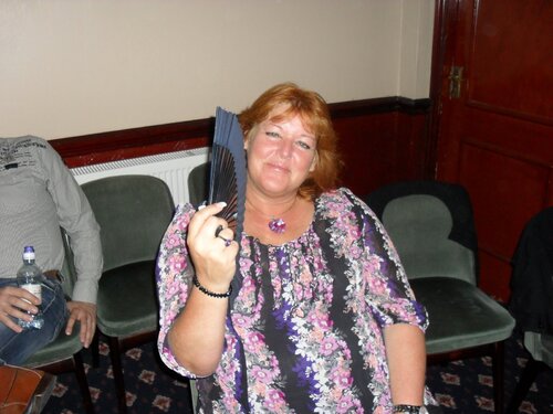 sandy with fan